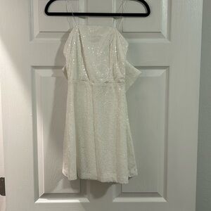 Mini sequin bow strapless dress